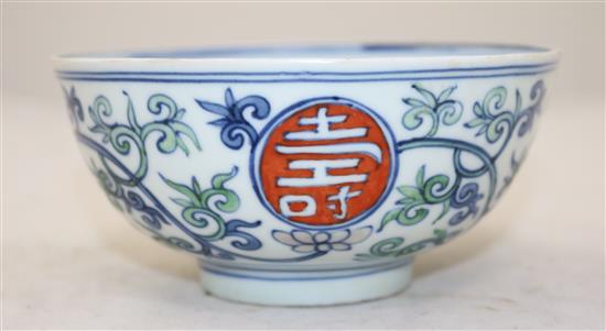 A Chinese doucai shou medallion bowl, bearing a Jiajing six character seal mark, 14cm